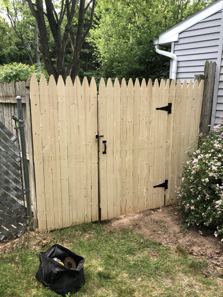 wooden fence gate installed in Saline, MI, by our craftsmen
