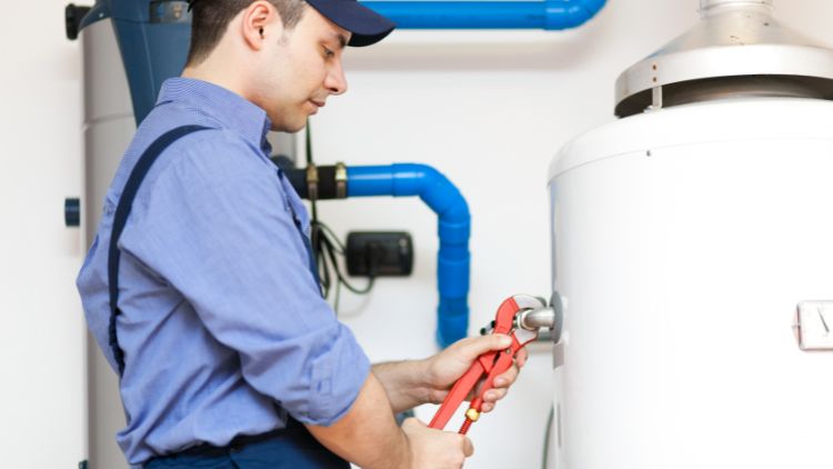 https://www.handymanconnection.net/calgary/wp-content/uploads/sites/14/2025/08/When-And-How-To-Replace-A-Water-Heater.jpg