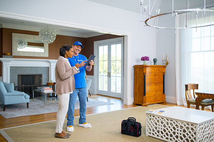 handyman from Handyman Connection going over service options with homeowner