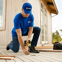 handyman repairing deck