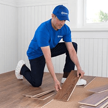 Handyman installing new flooring
