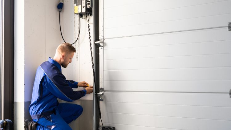 Contractor repairing the door