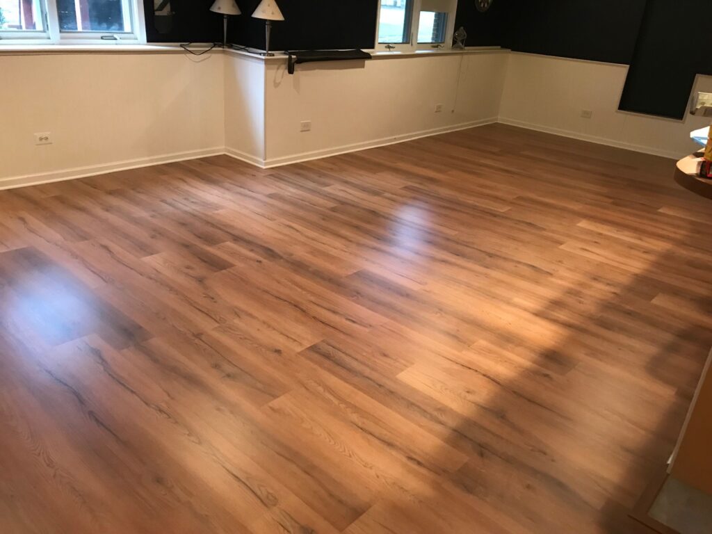 hardwood flooring installed in a Comstock Park home living room