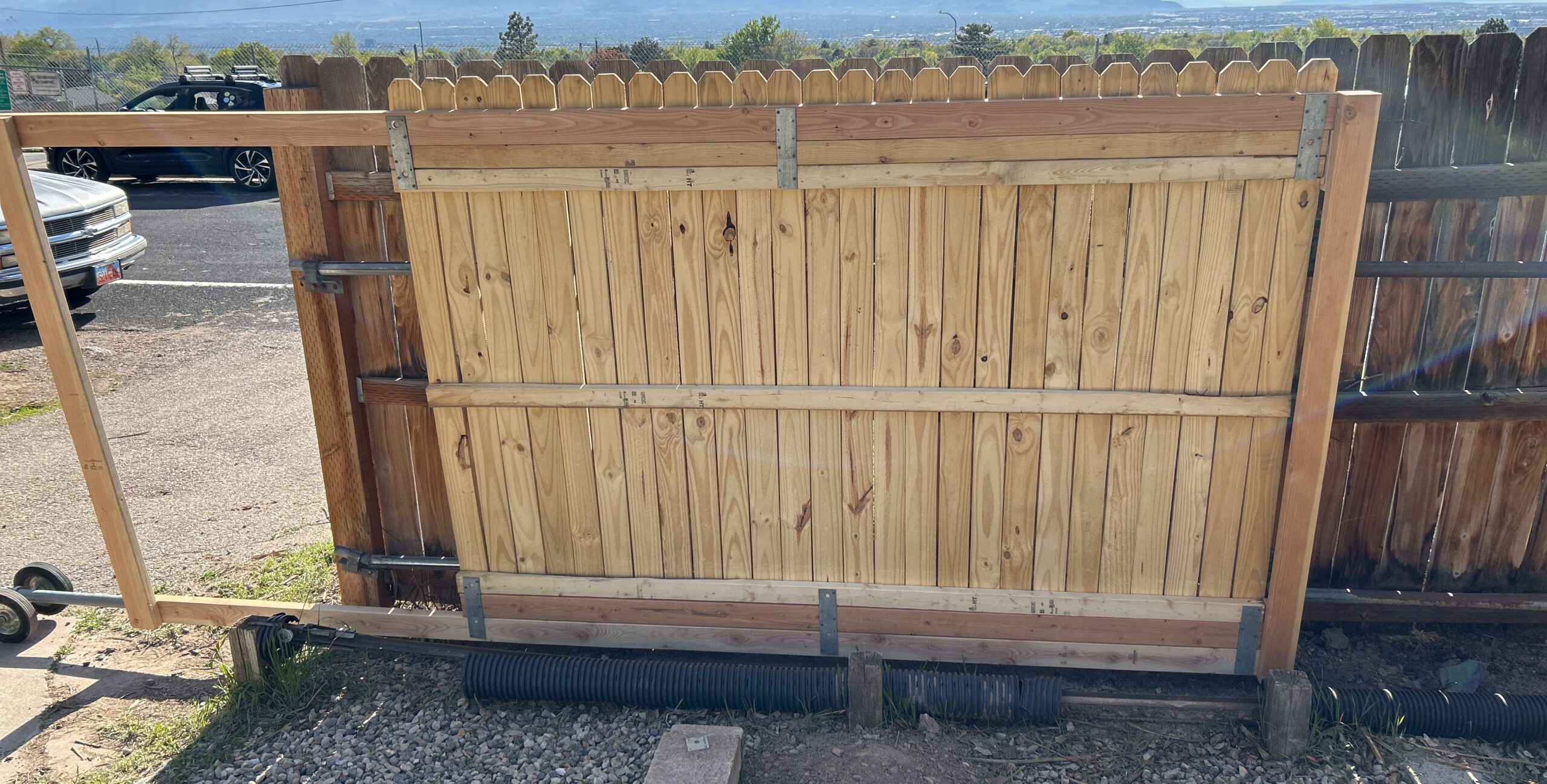 new fence gate being installed by our team in Atlantic Beach