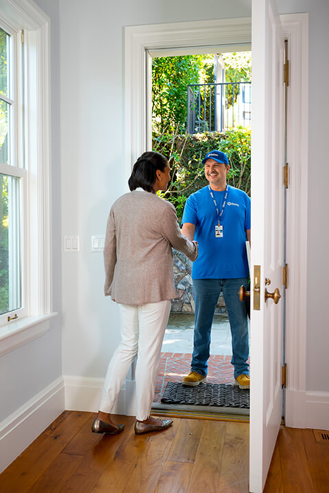 handyman from Handyman Connection greeting customer