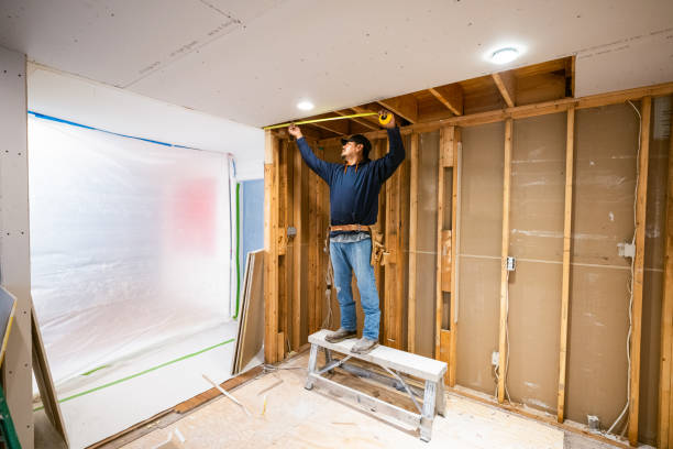 drywall repair handyman in Jeffersonville, KY, installing new drywall in a kitchen