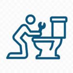 handyman working on a toilet installation