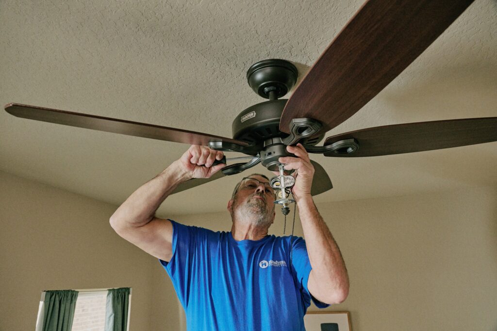 handyman in Watkins, CO, installing new ceiling fan