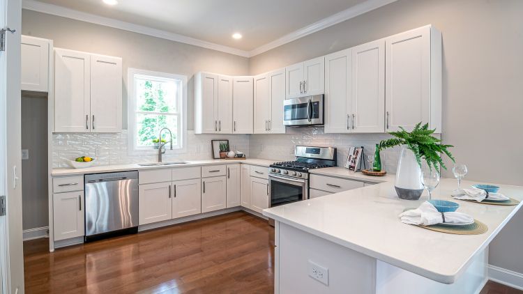 https://www.handymanconnection.net/victoria/wp-content/uploads/sites/52/2025/10/atin-Finishes-to-Elevate-Kitchen-Walls-and-Cabinets.jpg