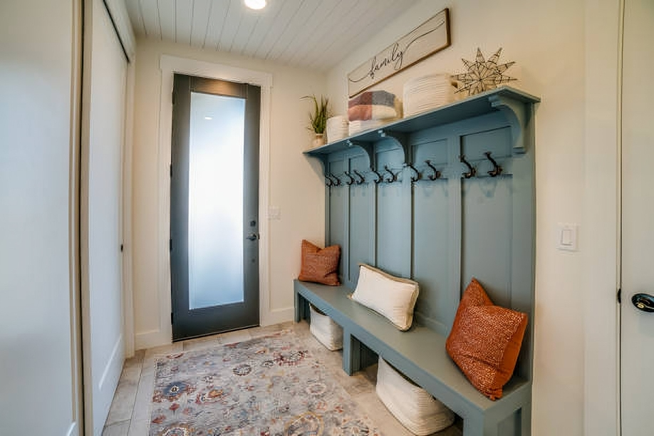 Custom mudroom with built-in cubbies and bench seating